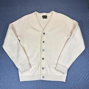 Vintage Sears knit cardigan in a soft cream tone.